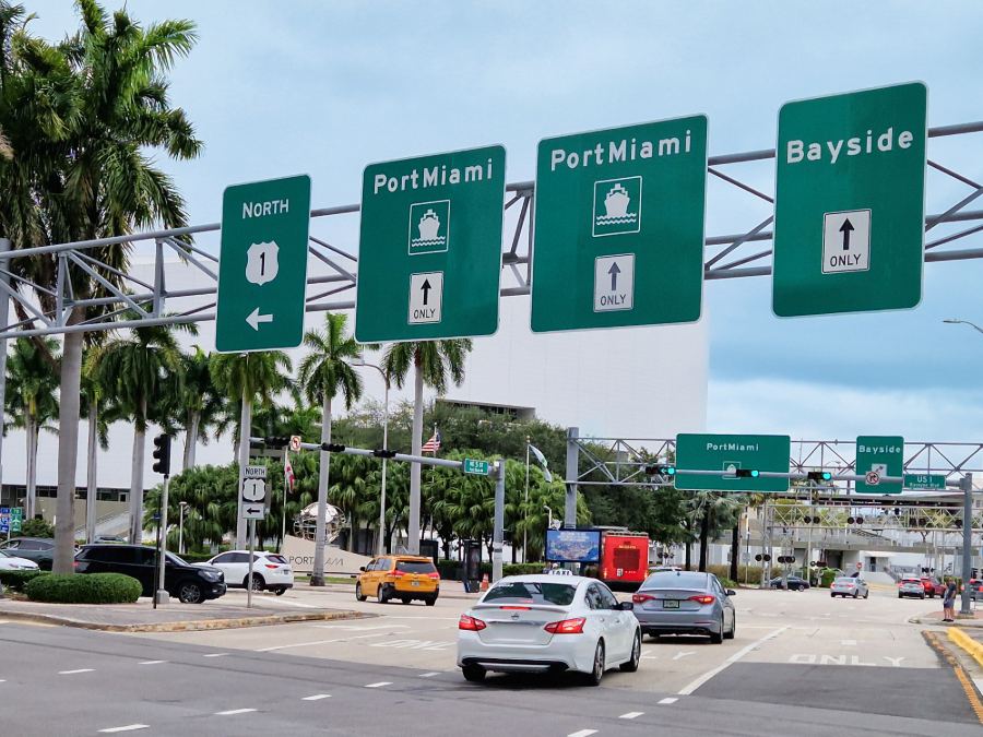 PortMiami road signs and cars driving to port